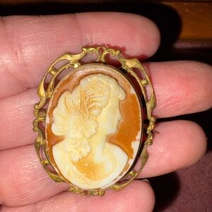 Elegant Gold and Cream Cameo Brooch